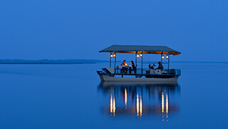 Boat cruise at night on Zambezi River