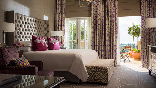Bedroom of presidential suite at Four Seasons Hotel The Westcliff
