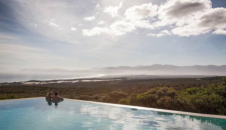 Couple swimming at Grootbos Private Nature Reserve 