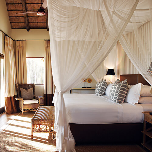 Bedroom of suite at Londolozi pioneer camp