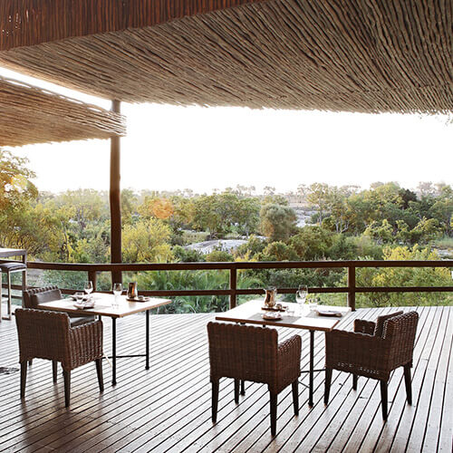 Dining deck over looking the bush at Londolozi private granite suites