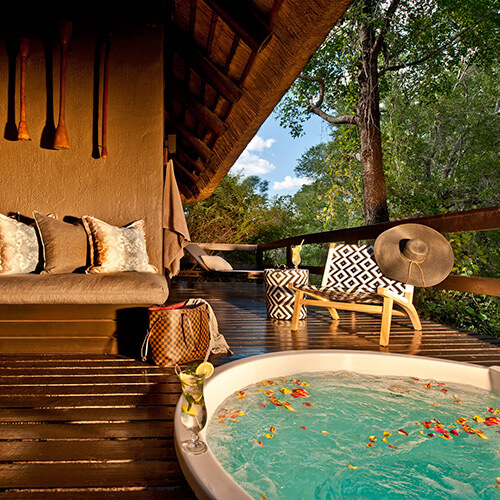Private plunge pool on the deck of Little Bush Lodge suite at Sabi Sabi Game Reserve