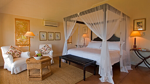 Bedroom of suite at Sanctuary Chichele Presidential Lodge