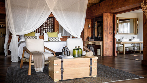 Bedroom of Sanctuary Chief’s Camp luxury pavillions