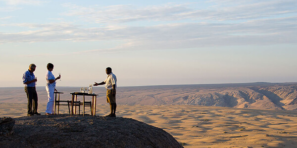 Sundowners overlooking the desert in Namibia