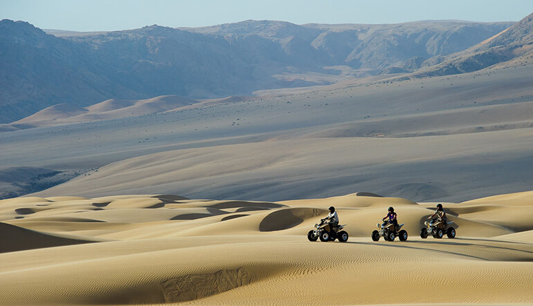 Quad biking along the dunes in Namibia