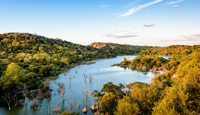 River running through Malilangwe Reserve Zimbabwe