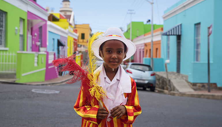 A boy standing in the road in the Bo Kaap in Cape Town