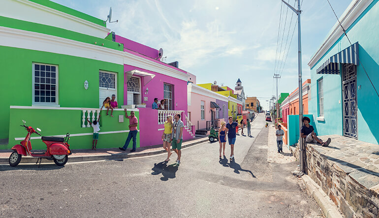 People walking through the streets of the Bo Kaap