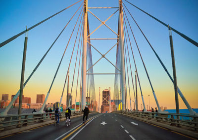 Cyclists going over Nelson Mandela Bridge in Johannesburg
