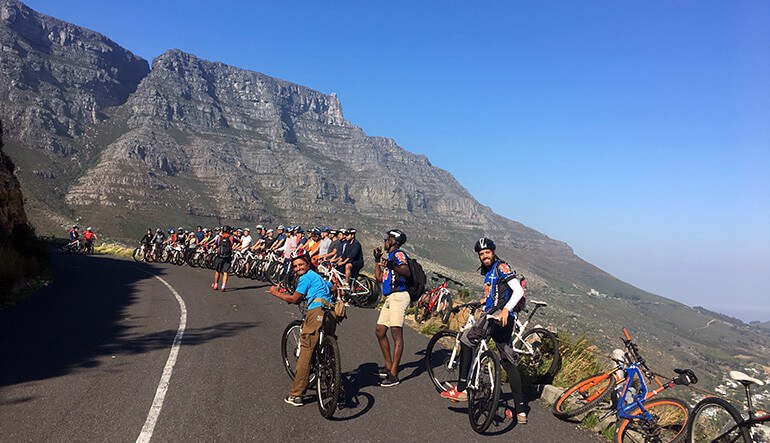 Group of people cycling on Table Mountain