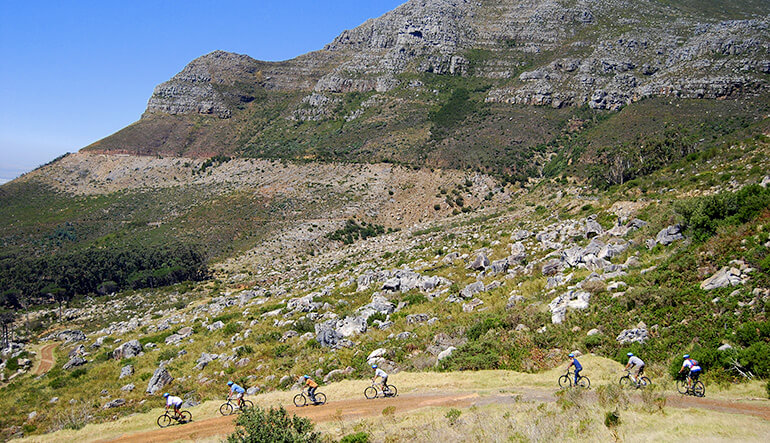 Group of people cycling on Table Mountain