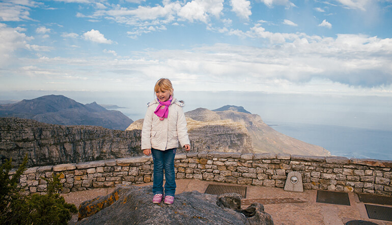 Girl enjoying the views on top of Table Mountain