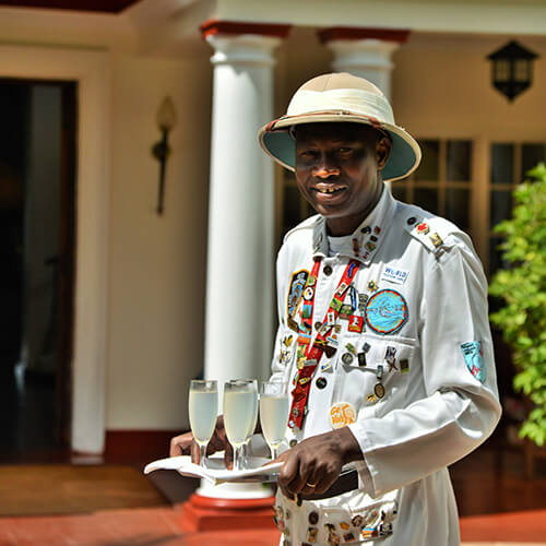 Doorman at Victoria Falls Hotel in Zimbabwe