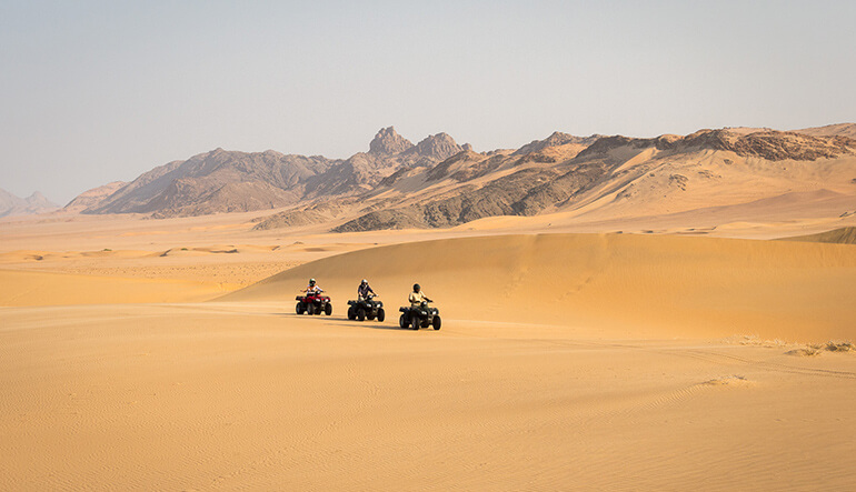 Quad biking on the dunes in Namibia