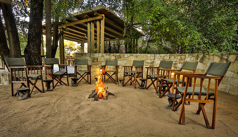 Fireplace seating at Bateleur Safari Camp 