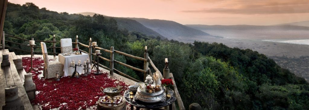 Romantic candlelit dinner on the deck of Ngorogoro Crater Lodge