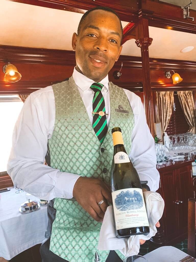 Sommelier with Hamilton Russel chardonnay on Rovos Rail