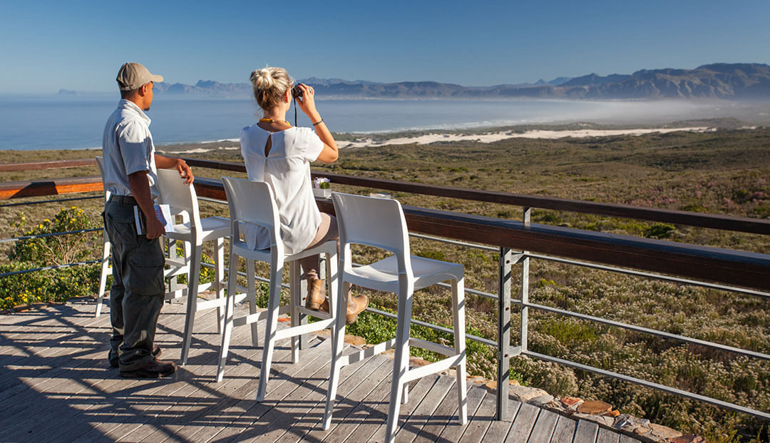 Woman looking at Stanford from Grootbos